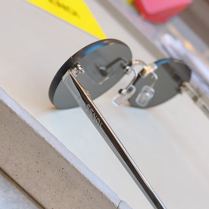 FIRST CRYSTAL OVAL FRAME SUNGLASSES FE4075US IN METAL