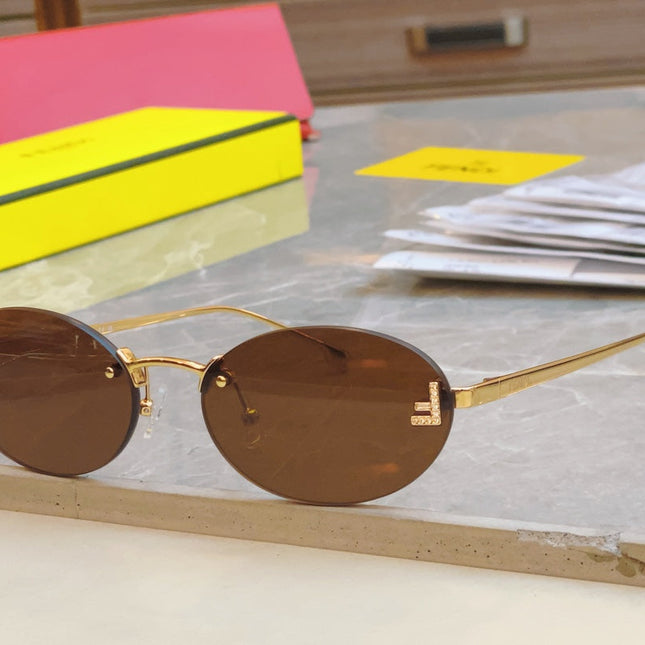 FIRST CRYSTAL OVAL FRAME SUNGLASSES FE4075US IN METAL