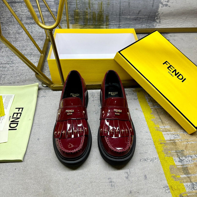 FENDI BAGUETTE LOAFERS IN MAROON RED CALFSKIN WITH GOLD HARDWARE