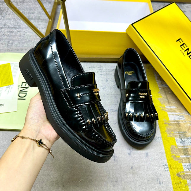 FENDI BAGUETTE LOAFERS IN BLACK CALFSKIN WITH GOLD HARDWARE