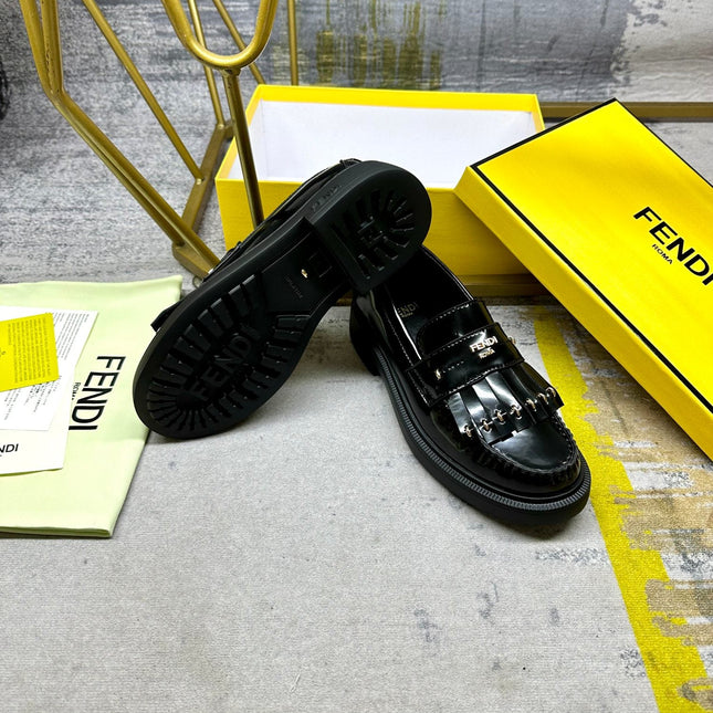 FENDI BAGUETTE LOAFERS IN BLACK CALFSKIN WITH GOLD HARDWARE