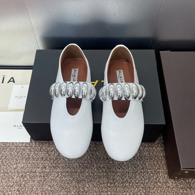 ALAIA MARY JANE FLATS 25S IN WHITE CALFSKIN WITH SILVER HARDWARE