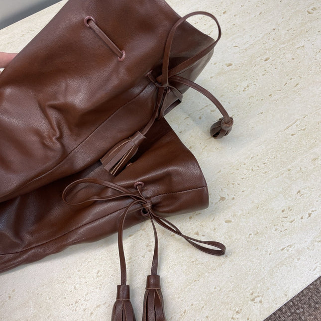 YSL 25S HIGH‑HEEL FRINGED MARTIN BOOTS 90 MM IN DARK BROWN LAMBSKIN