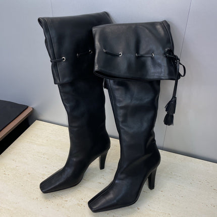 YSL 25S HIGH‑HEEL FRINGED MARTIN BOOTS 90 MM IN BLACK LAMBSKIN