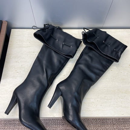 YSL 25S HIGH‑HEEL FRINGED MARTIN BOOTS 90 MM IN BLACK LAMBSKIN