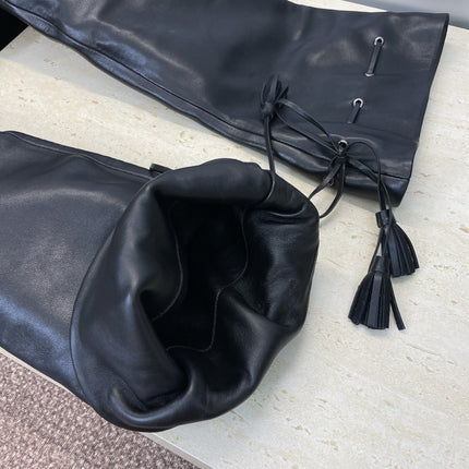 YSL 25S HIGH‑HEEL FRINGED MARTIN BOOTS 90 MM IN BLACK LAMBSKIN