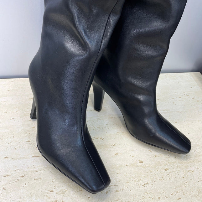 YSL 25S HIGH‑HEEL FRINGED MARTIN BOOTS 90 MM IN BLACK LAMBSKIN