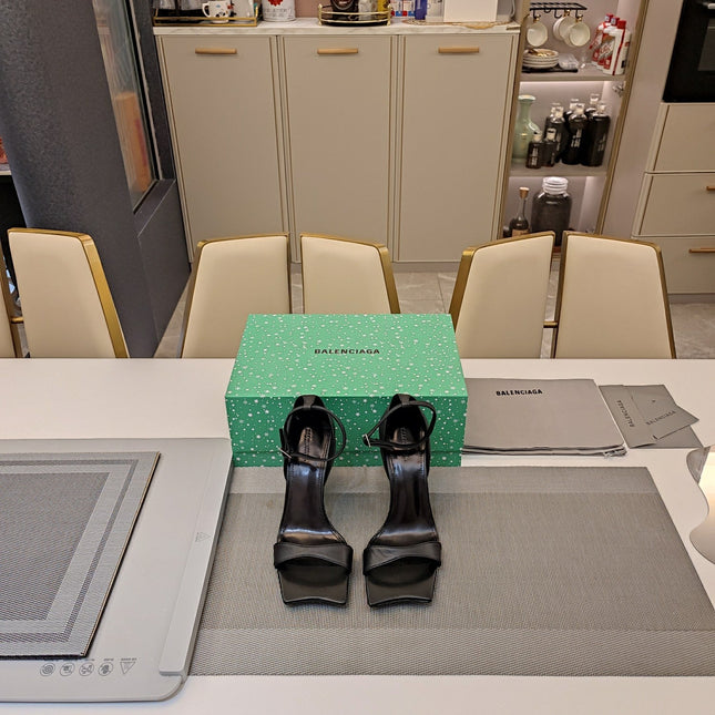 OPEN-TOE CURVED HIGH HEEL SANDALS IN BLACK SMOOTH CALFSKIN