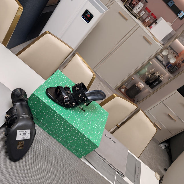 STRAPPY HIGH-HEELED SANDALS IN BLACK STUDDED WAX-OIL SHEEPSKIN