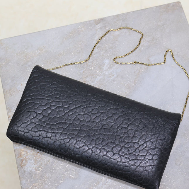 CALYPSO POUCH 24 IN BLACK ELEPHANT TEXTURED LAMBSKIN GOLD LOGO