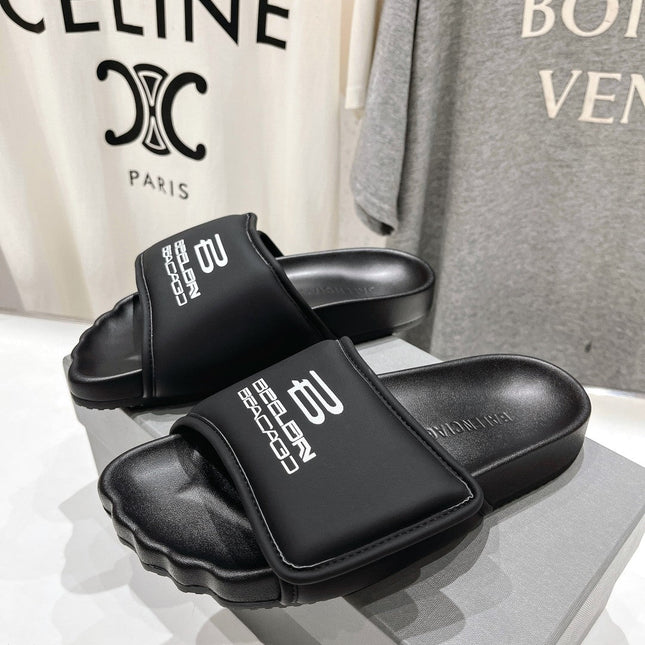 SLIDE SANDALS IN BLACK NYLON AND RUBBER WHITE PRINT