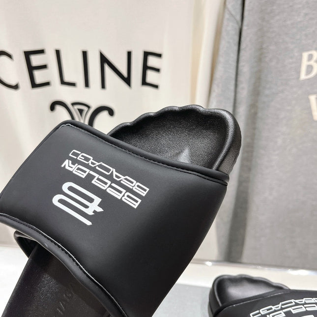 SLIDE SANDALS IN BLACK NYLON AND RUBBER WHITE PRINT