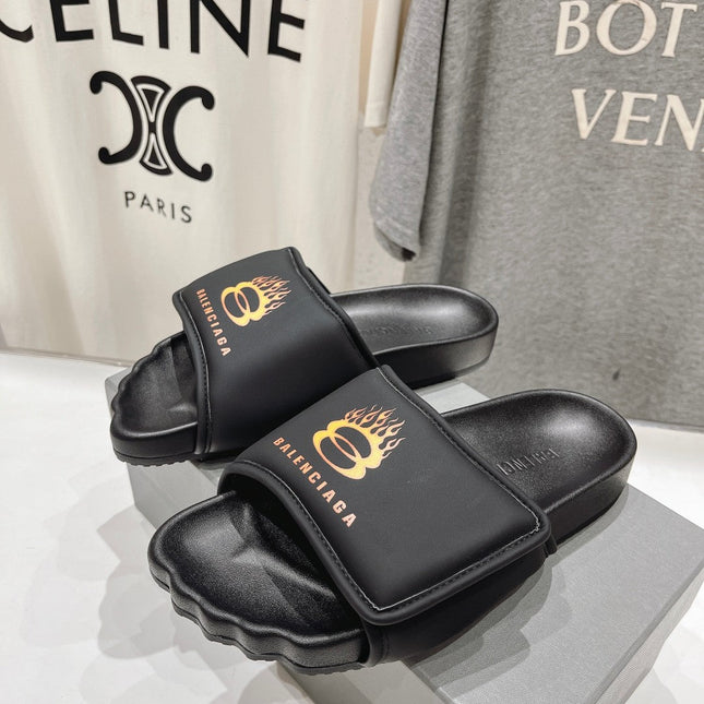 SLIDE SANDALS IN BLACK NYLON AND RUBBER YELLOW PRINT