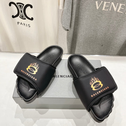 SLIDE SANDALS IN BLACK NYLON AND RUBBER YELLOW PRINT