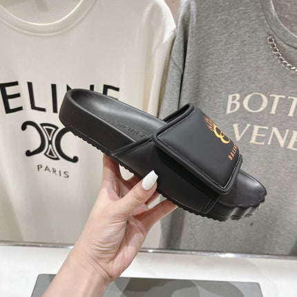 SLIDE SANDALS IN BLACK NYLON AND RUBBER YELLOW PRINT