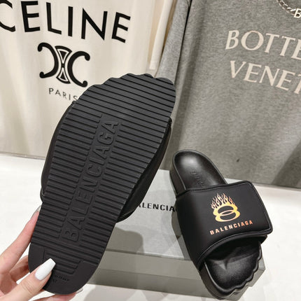 SLIDE SANDALS IN BLACK NYLON AND RUBBER YELLOW PRINT