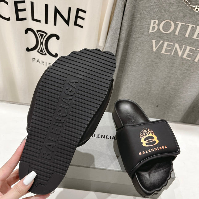 SLIDE SANDALS IN BLACK NYLON AND RUBBER YELLOW PRINT