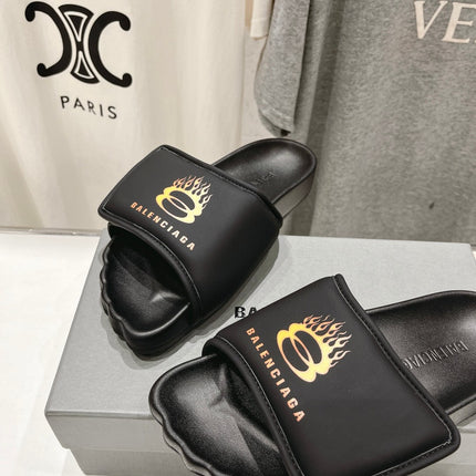 SLIDE SANDALS IN BLACK NYLON AND RUBBER YELLOW PRINT