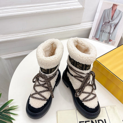FENDI BOOTS 50MM IN BLACK AND BEIGE SHEARLING AND SUEDE