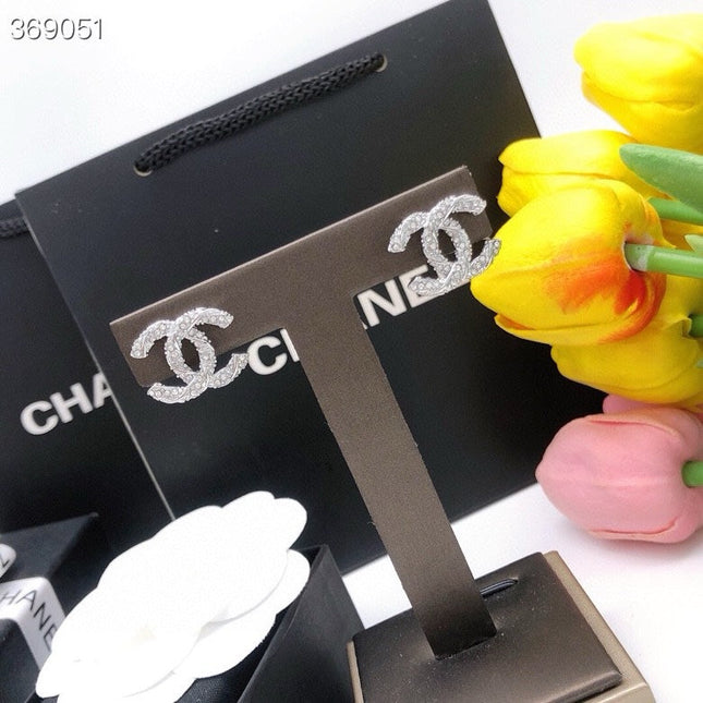 STUD EARRINGS MINI DOUBLE C TWISTED IN SILVER DIAMOND