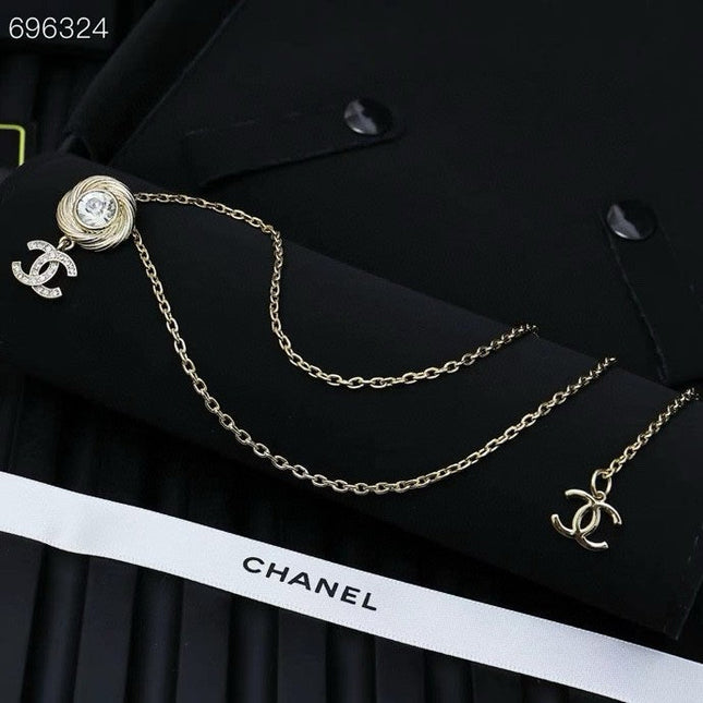 PENDANT NECKLACE IN GOLD TWISTED RIBBED DOUBLE C